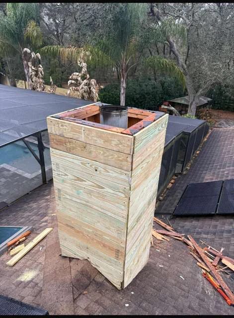 Chimney chase before repair, bare framing — Chimney Brothers Co Florida