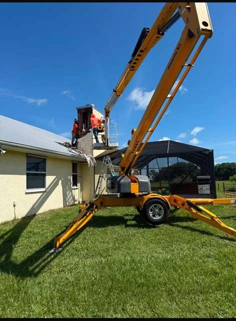 Chimney Brothers Co crew rebuilding a chimney in Florida