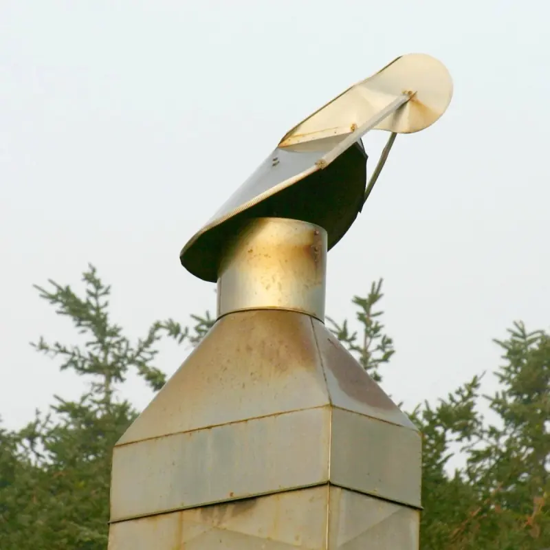 Directional metal chimney cap