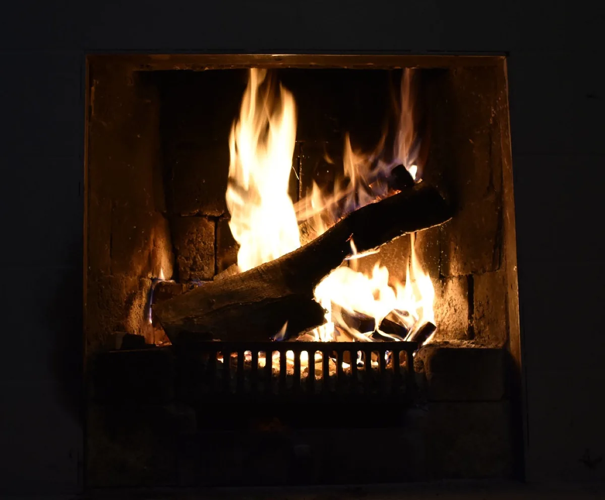Wood fire burning in an open fireplace